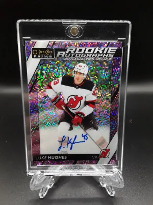 2023/24 OPC Platinum Violet Pixel Auto Luke Huges #'d 1/99 /99 Devils front